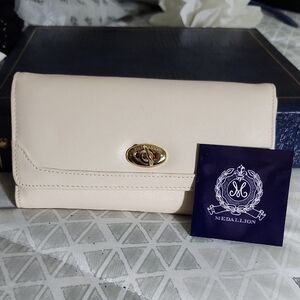 Elegant Cream Wallet with Gold Turn-Lock